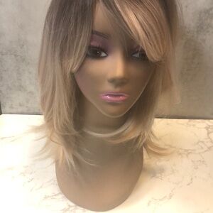 Brand new stylish blonde layered wig with bangs